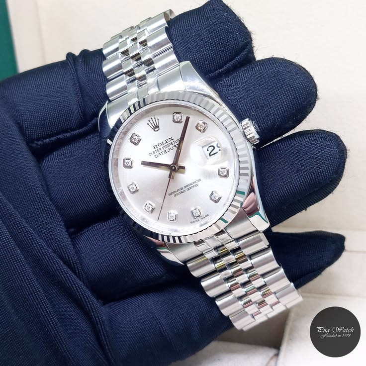 ROLEX DIAMOND GRIS TABLEAU BLANC
