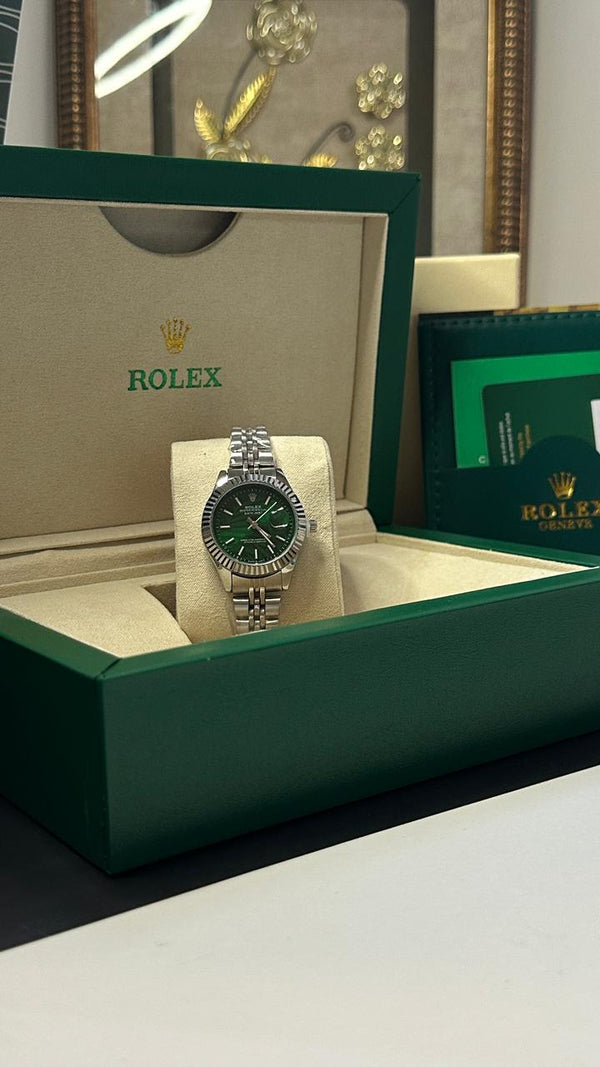 ROLEX FEMME GRIS TABLEAU VERT