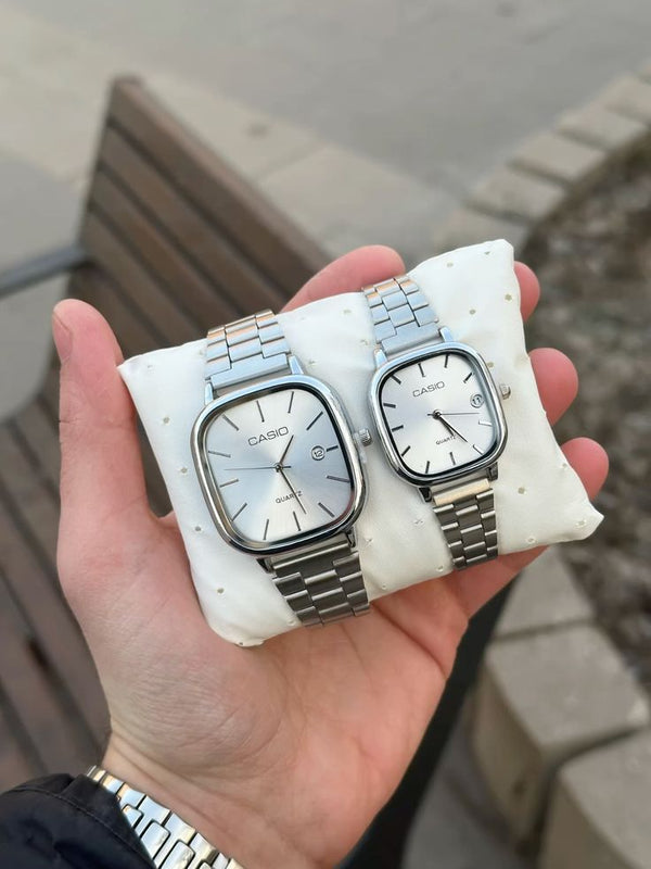 2 Montres couple gris tableau blanc
