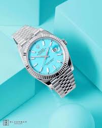ROLEX OYSTER GRIS TABLEAU BLEU CIEL